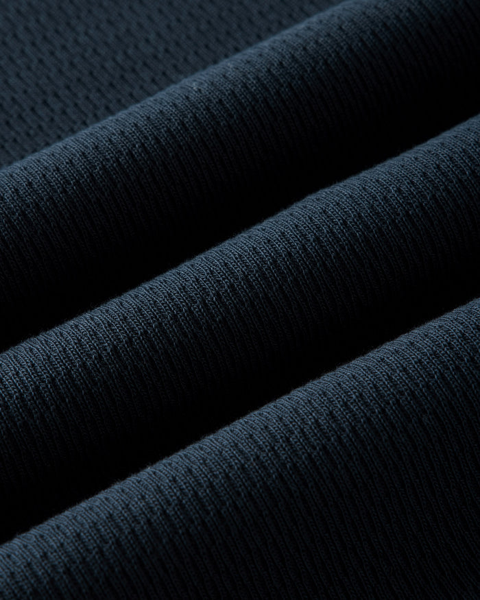 Seed-stitch waffle texture detail of The Organic Cotton Crew in Dark Navy Waffle