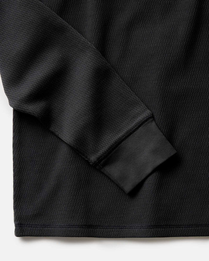 material shot of the sleeve on The Organic Cotton Crew in Faded Black Waffle