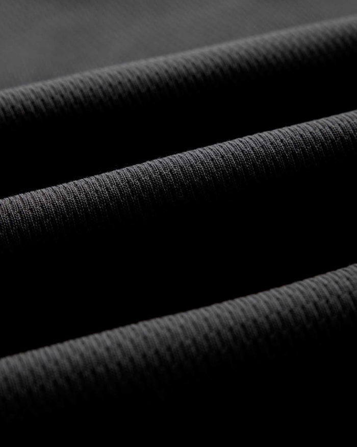 material shot of the fabric on The Organic Cotton Crew in Faded Black Waffle