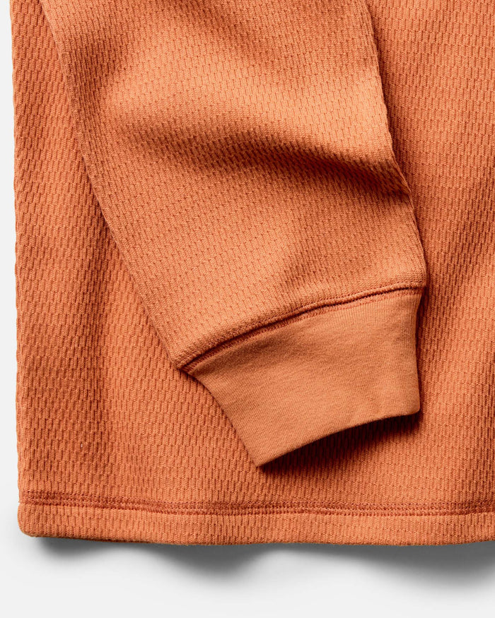 material shot of the sleeve on The Organic Cotton Crew in Summit Orange Waffle