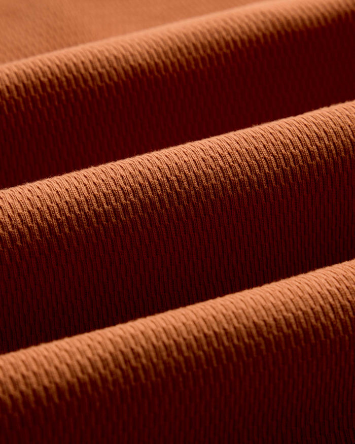 material shot of the fabric on The Organic Cotton Crew in Summit Orange Waffle