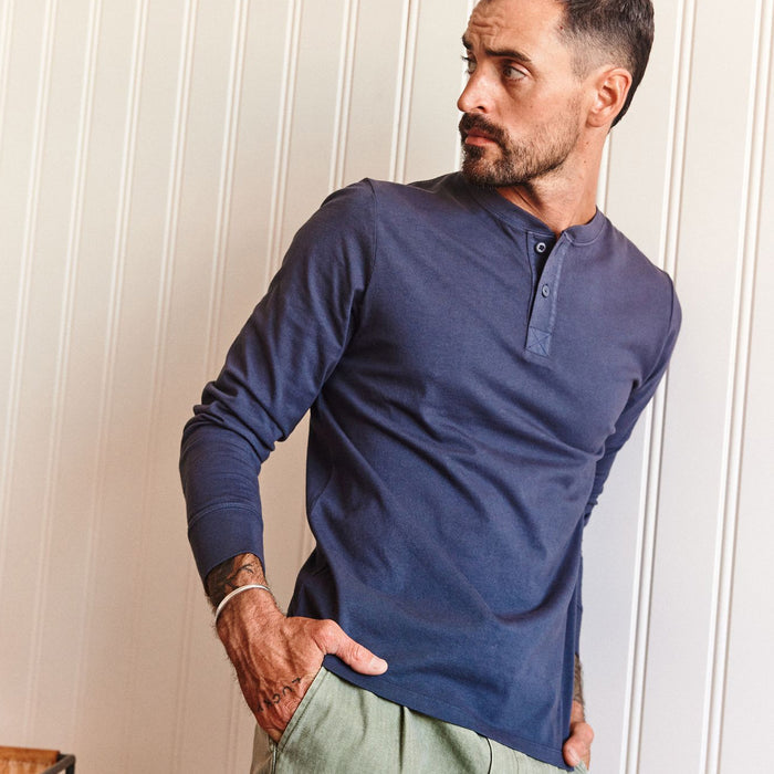 fit model posing in The Organic Cotton Henley in Navy