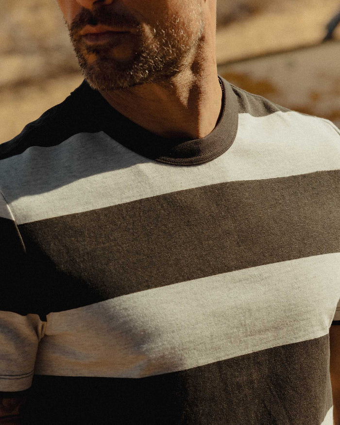 fit model showing off The Organic Cotton Shop Tee in Faded Black Stripe