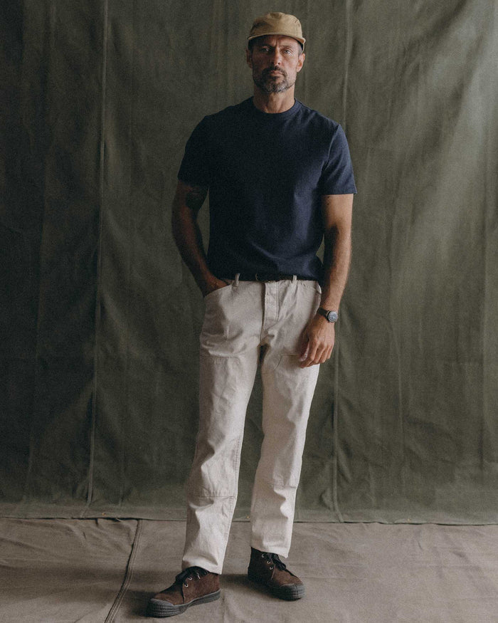fit model holding a canoe wearing The Organic Cotton Shop Tee in Navy Twist