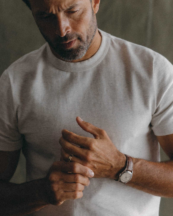 fit model tying a rope wearing The Organic Cotton Shop Tee in Oat Twist