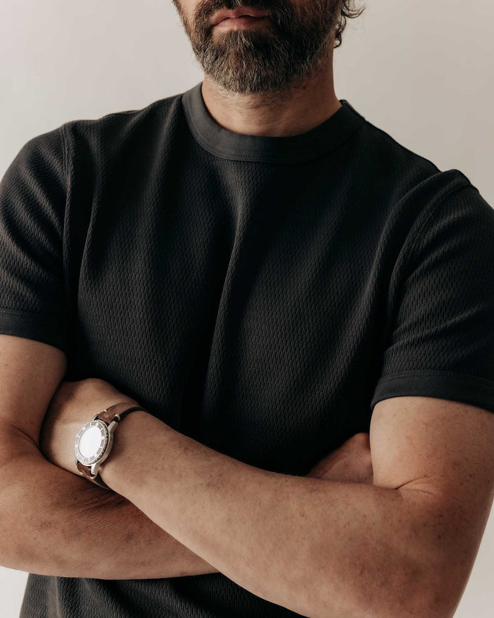 fit model in The Organic Cotton Short Sleeve Crew in Faded Black Waffle