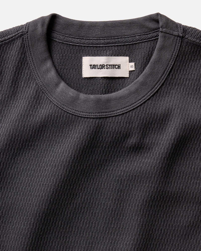 material shot of the neck opening of The Organic Cotton Short Sleeve Crew in Faded Black Waffle