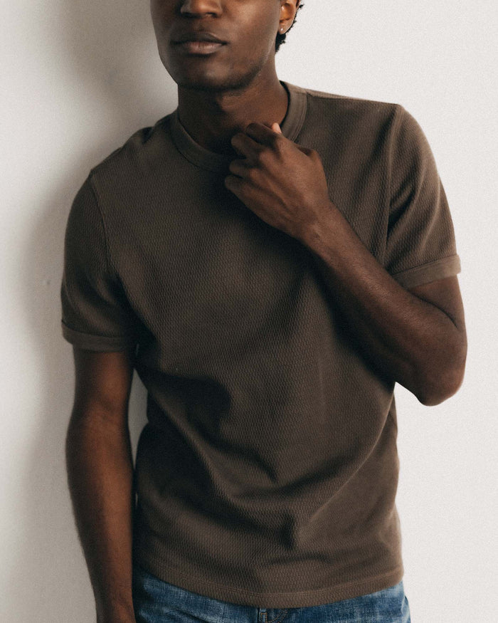 fit model wearing The Organic Cotton Short Sleeve Crew in Fatigue Olive Waffle