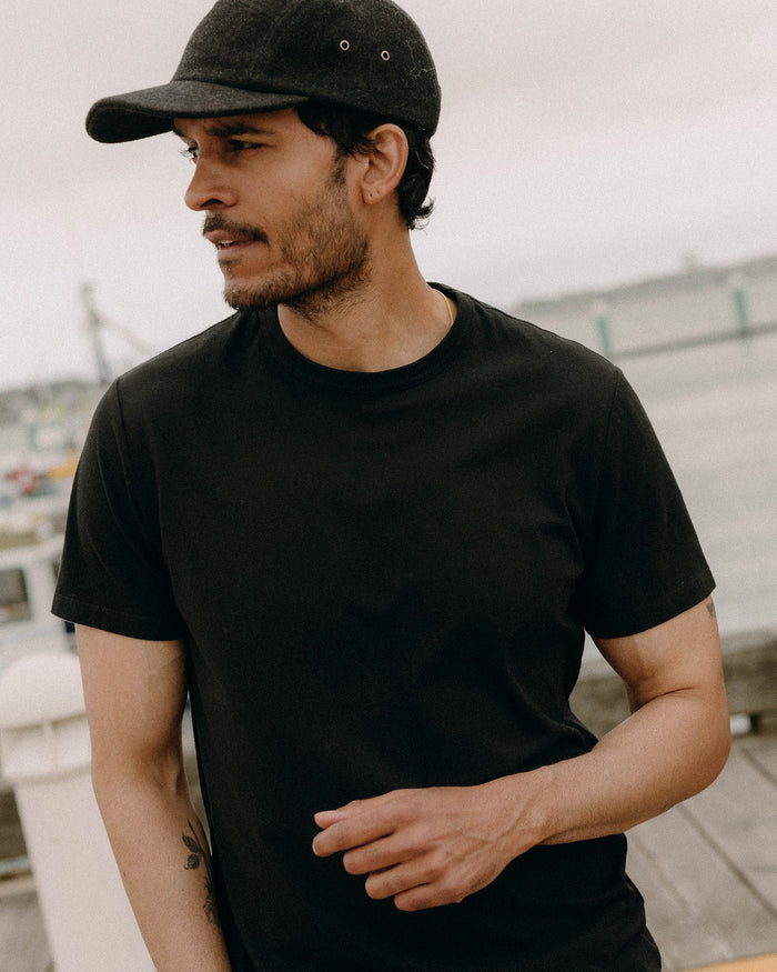 fit model posing in The Organic Cotton Tee in Black