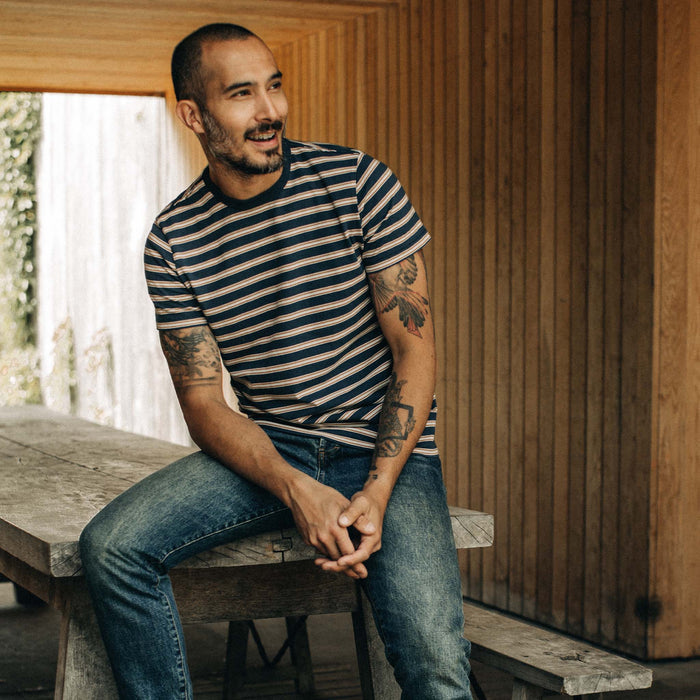 fit model wearing The Organic Cotton Tee in Deep Sea Stripe