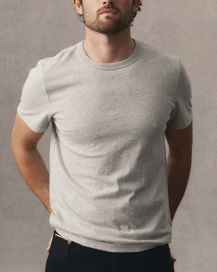 fit model wearing The Organic Cotton Tee in Heather Grey