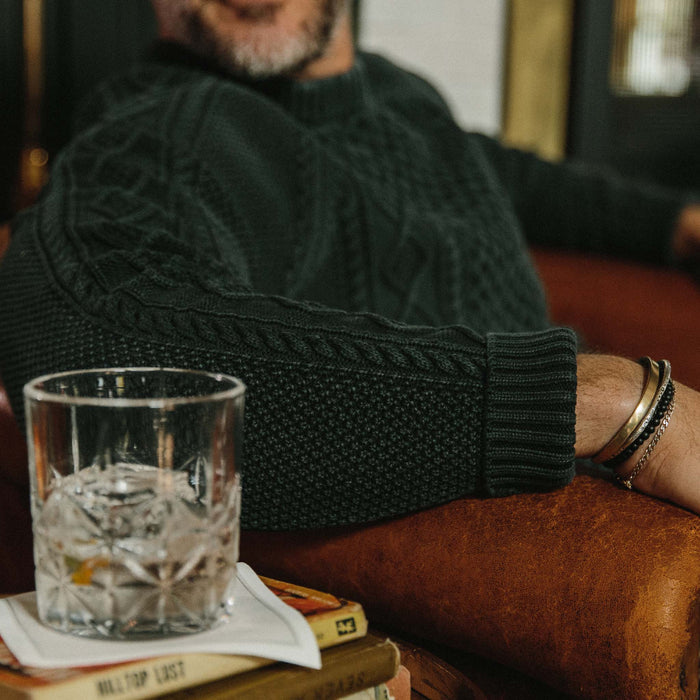Fit model wearing The Orr Sweater in Charcoal showing sleeve