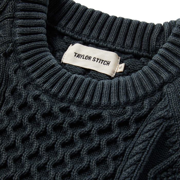 material shot of The Orr Sweater in Charcoal showing interior label