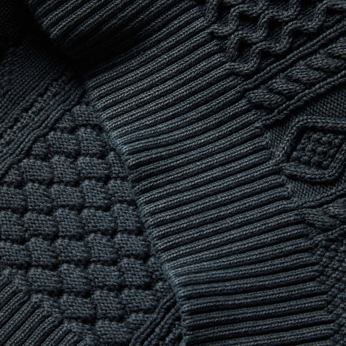 material shot showing hem of The Orr Sweater in Charcoal