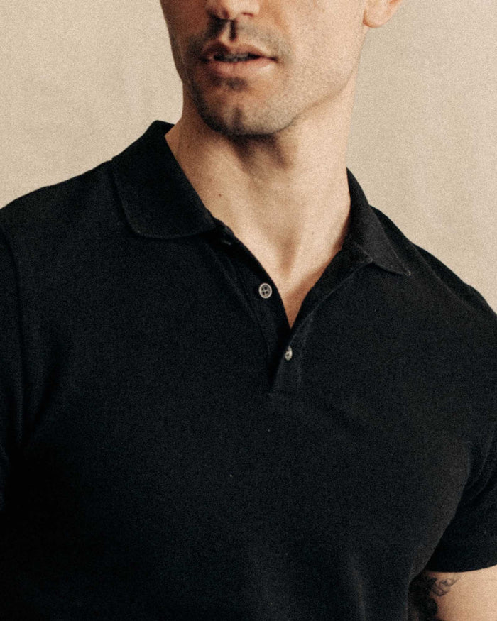 fit model showing off the collar on The Pacific Polo in Black Indigo Pique