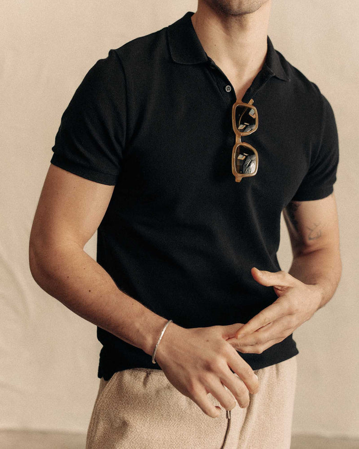 fit model wearing The Pacific Polo in Black Indigo Pique
