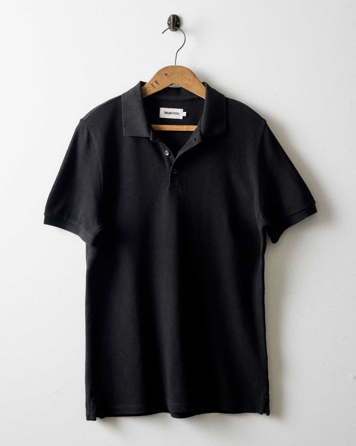 editorial image of The Pacific Polo in Black Indigo Pique hanging