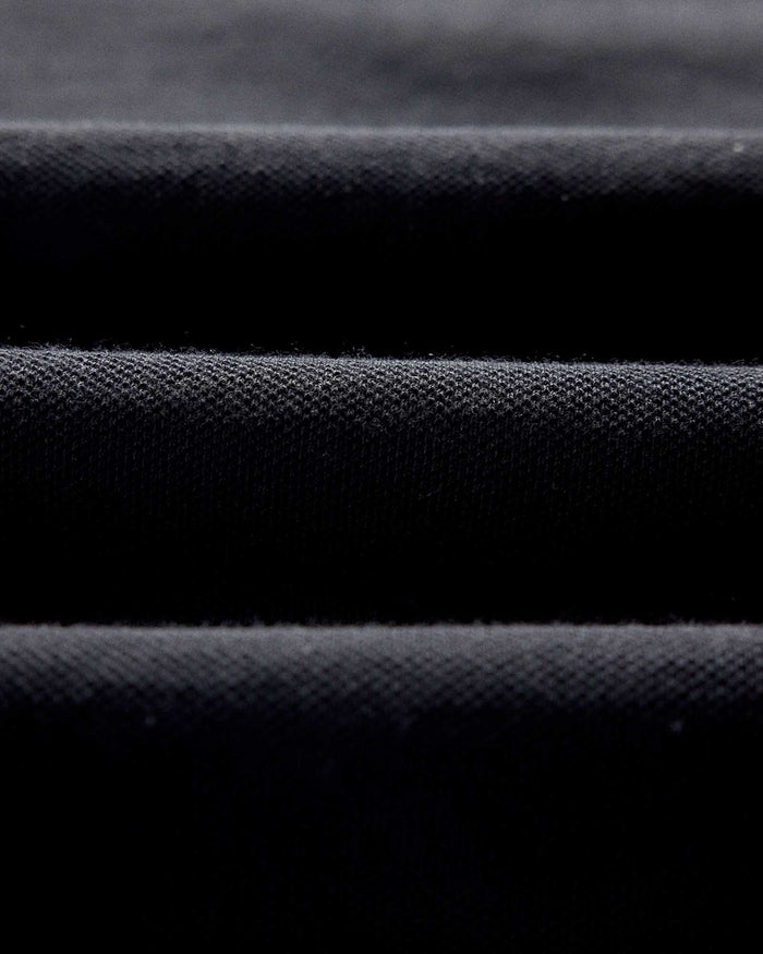 material shot of the fabric on The Pacific Polo in Black Indigo Pique