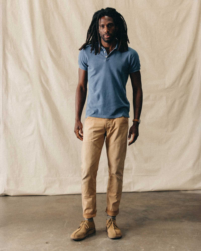 fit model posing in The Pacific Polo in Washed Indigo Pique