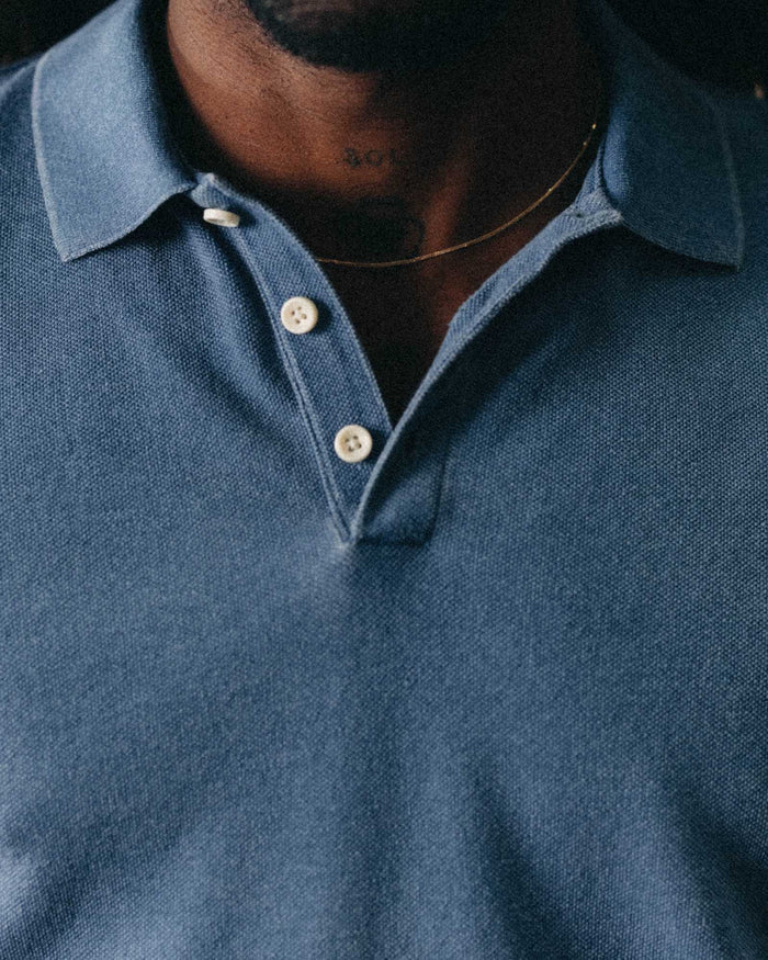 fit model showing off the collar on The Pacific Polo in Washed Indigo Pique