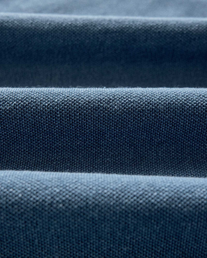 material shot of the fabric on The Pacific Polo in Washed Indigo Pique