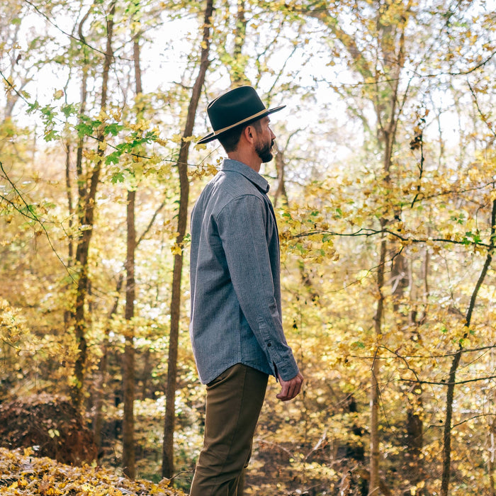 fit model wearing The Packable Lane Splitter in Espresso, looking right