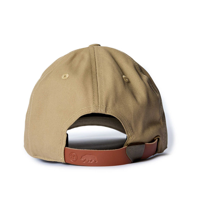 editorial image of the back of The Pathfinder Cap in Khaki Dry Wax