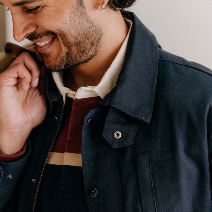 fit model showing off collar on The Pathfinder Jacket in Dark Navy Dry Wax