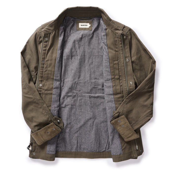 flatlay of the inside of The Pathfinder Jacket in Fatigue Olive Dry Wax