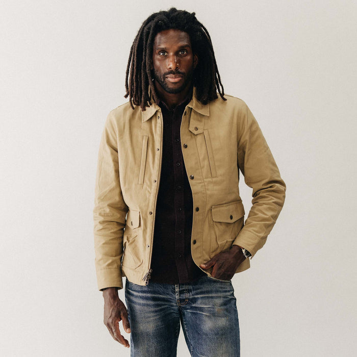 fit model wearing The Pathfinder Waxed Canvas Jacket in Khaki Dry Wax
