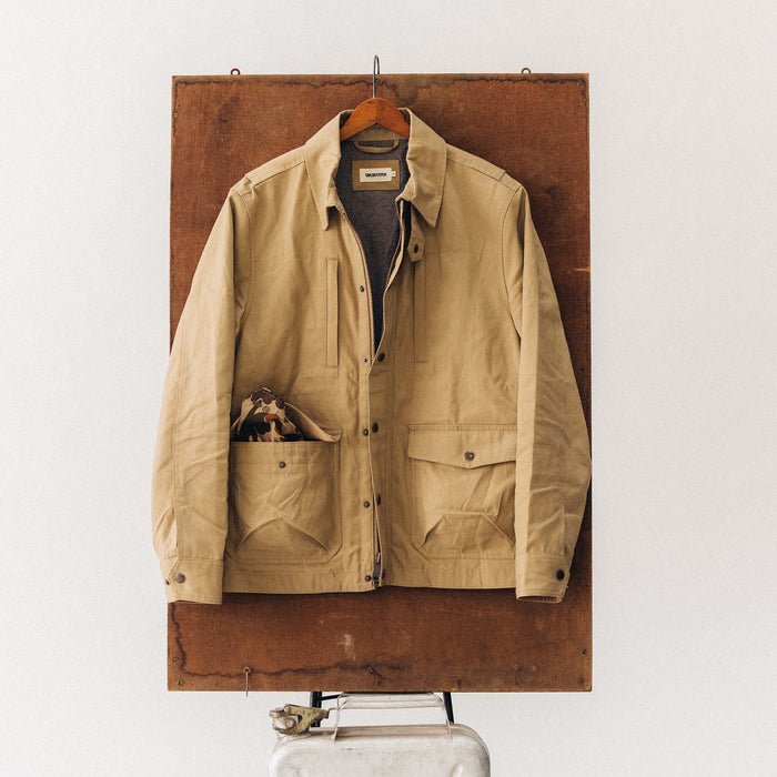 editorial image of The Pathfinder Jacket in Khaki Dry Wax hanging