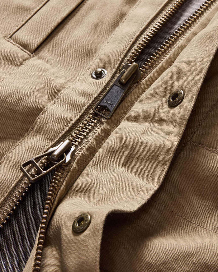 material shot of the two-way zipper on The Pathfinder Jacket in Khaki Dry Wax