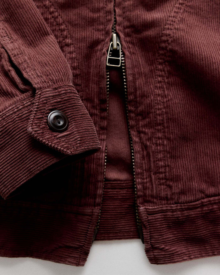 material shot of the zipper on The Piston Jacket in Dried Cherry Corduroy