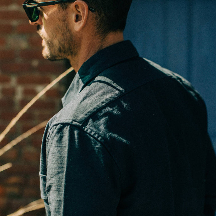 fit model wearing The Point Shirt in Navy Reverse Sateen, side detail