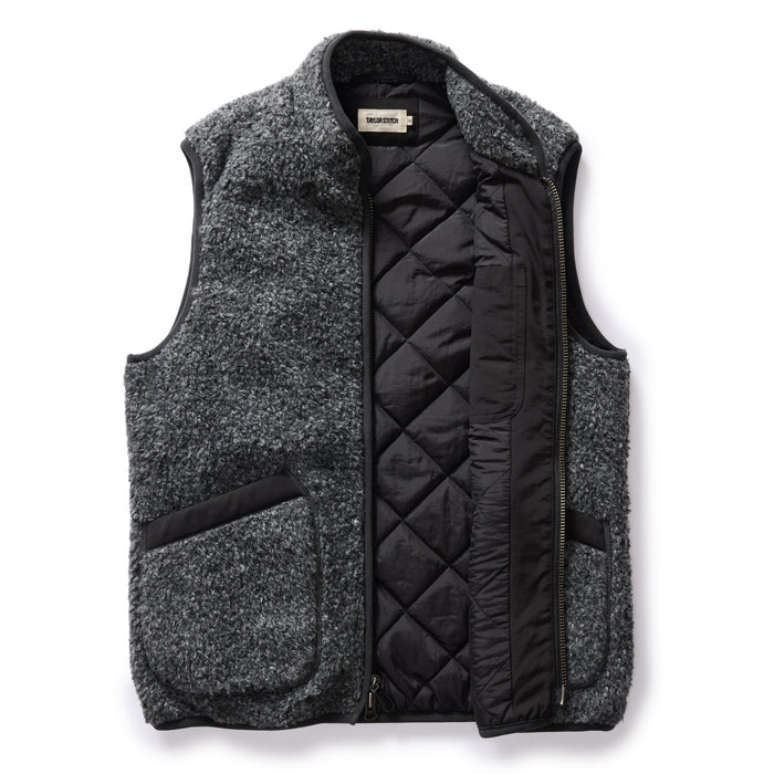 flatlay of The Port Vest in Coal Marl Boucle Fleece open