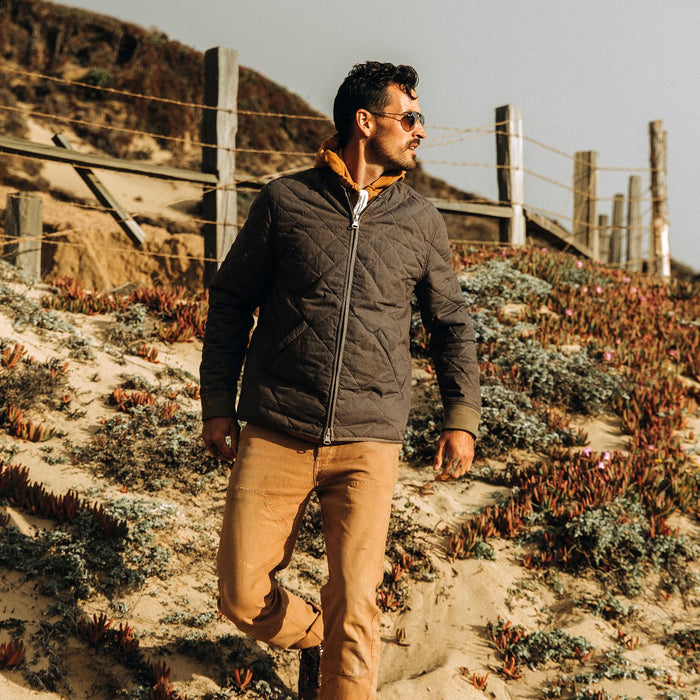 fit model wearing The Quilted Bomber Jacket in Espresso, looking right