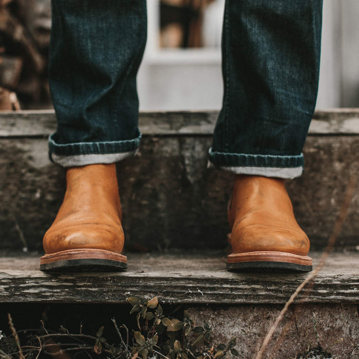 The fit model wearing the ranch boot