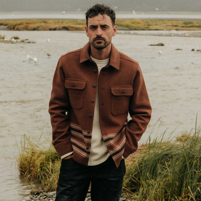 fit model showing off The Ranger Shirt in Tarnished Copper Blanket Stripe
