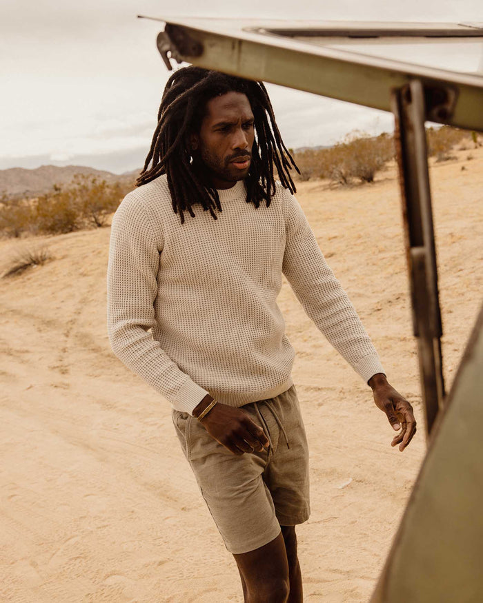 fit model walking wearing The Ranger Sweater in Heather Fog Linen Waffle