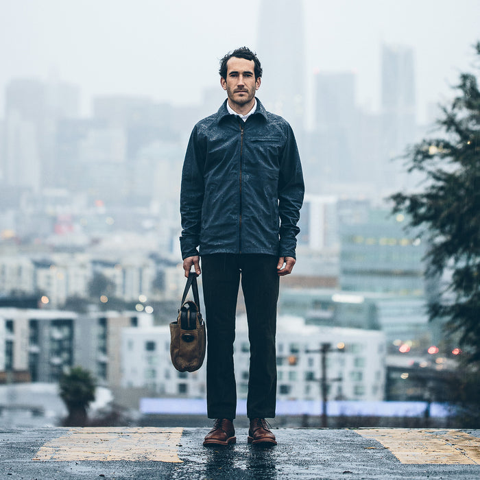 Mikey in the city wearing the rain proof jacket