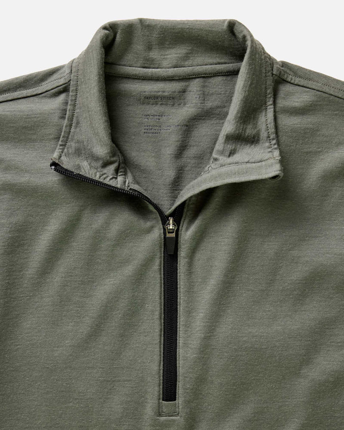 material shot of the collar on The Ridgeline Merino Half Zip in Field Olive