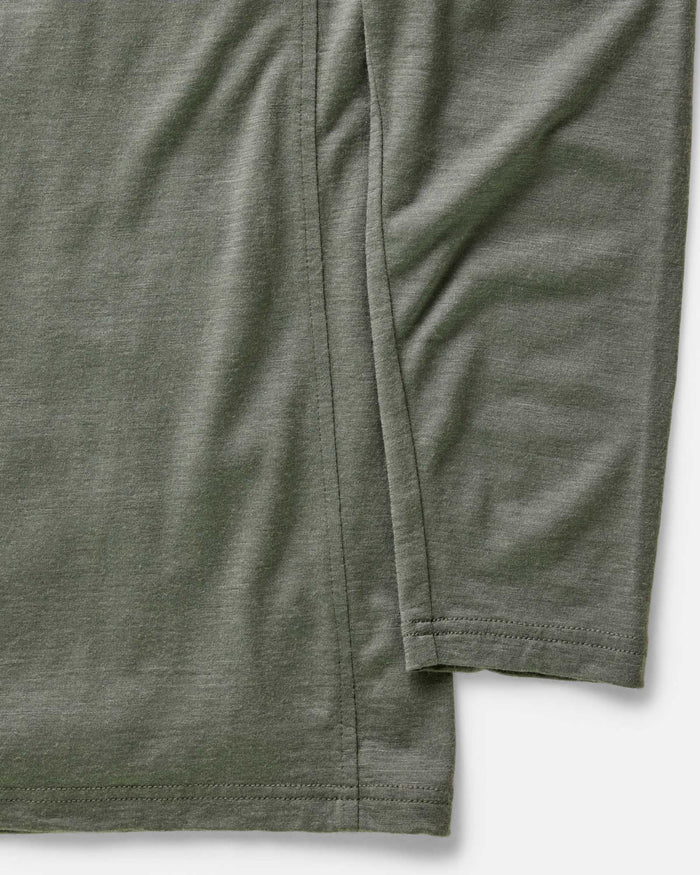 material shot of the sleeves on The Ridgeline Merino Half Zip in Field Olive
