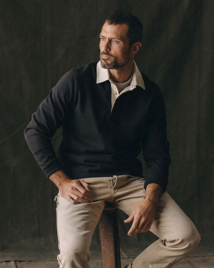 fit model posing in The Rugby Shirt in Coal
