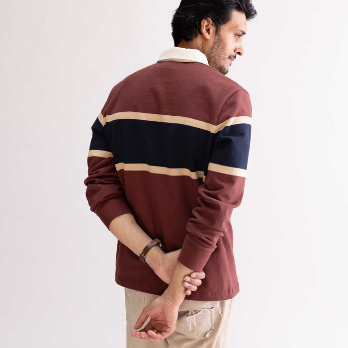 fit model showing off the back of The Rugby Shirt in Dried Cherry Stripe