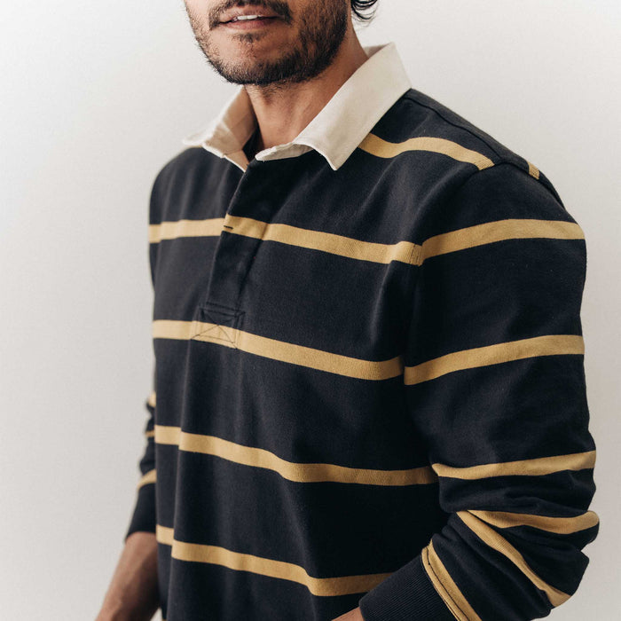 fit model showing off the collar on The Rugby Shirt in Faded Black Stripe