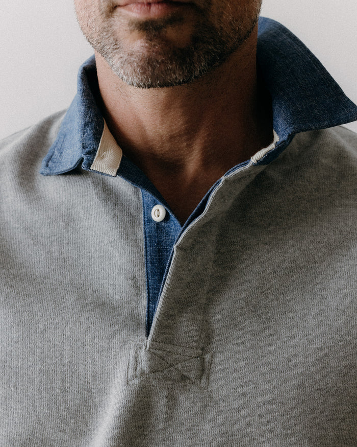 fit model showing off the collar on The Rugby Shirt in Heather Grey