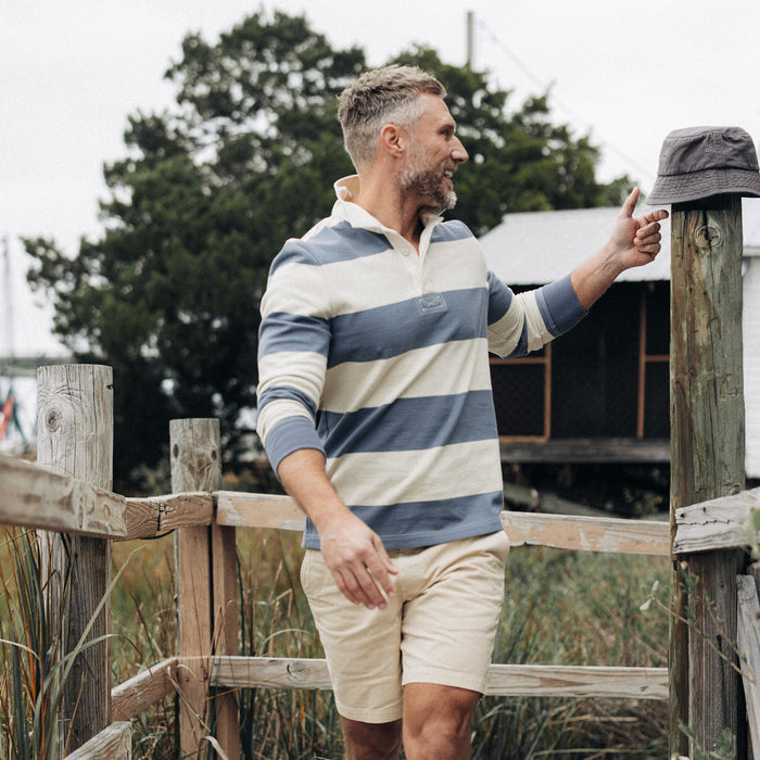 fit model walking in The Rugby Shirt in Storm Stripe