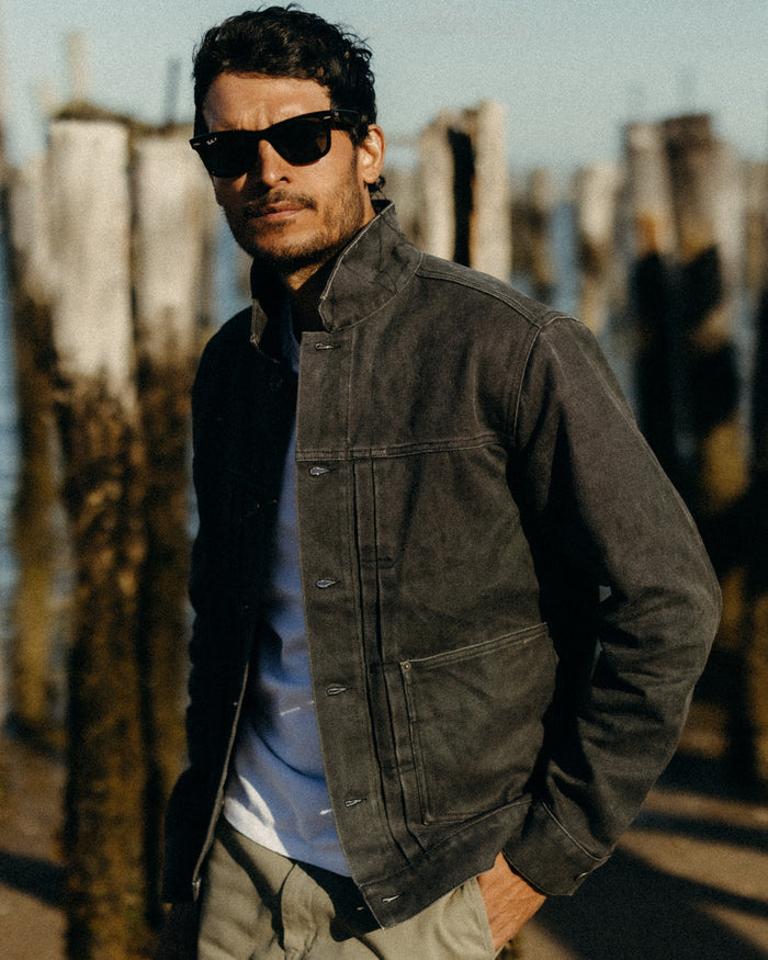 fit model posing in The Ryder Jacket in Coal Chipped Canvas