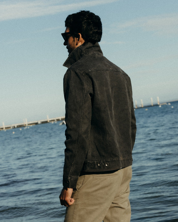 fit model showing off the back of The Ryder Jacket in Coal Chipped Canvas