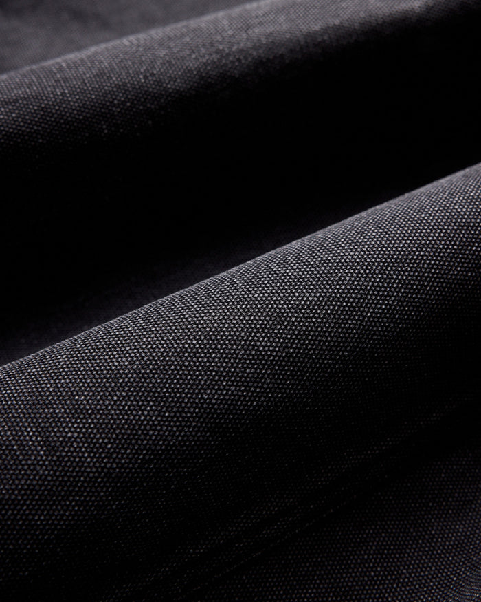 material shot of the fabric on The Ryder Jacket in Coal Chipped Canvas